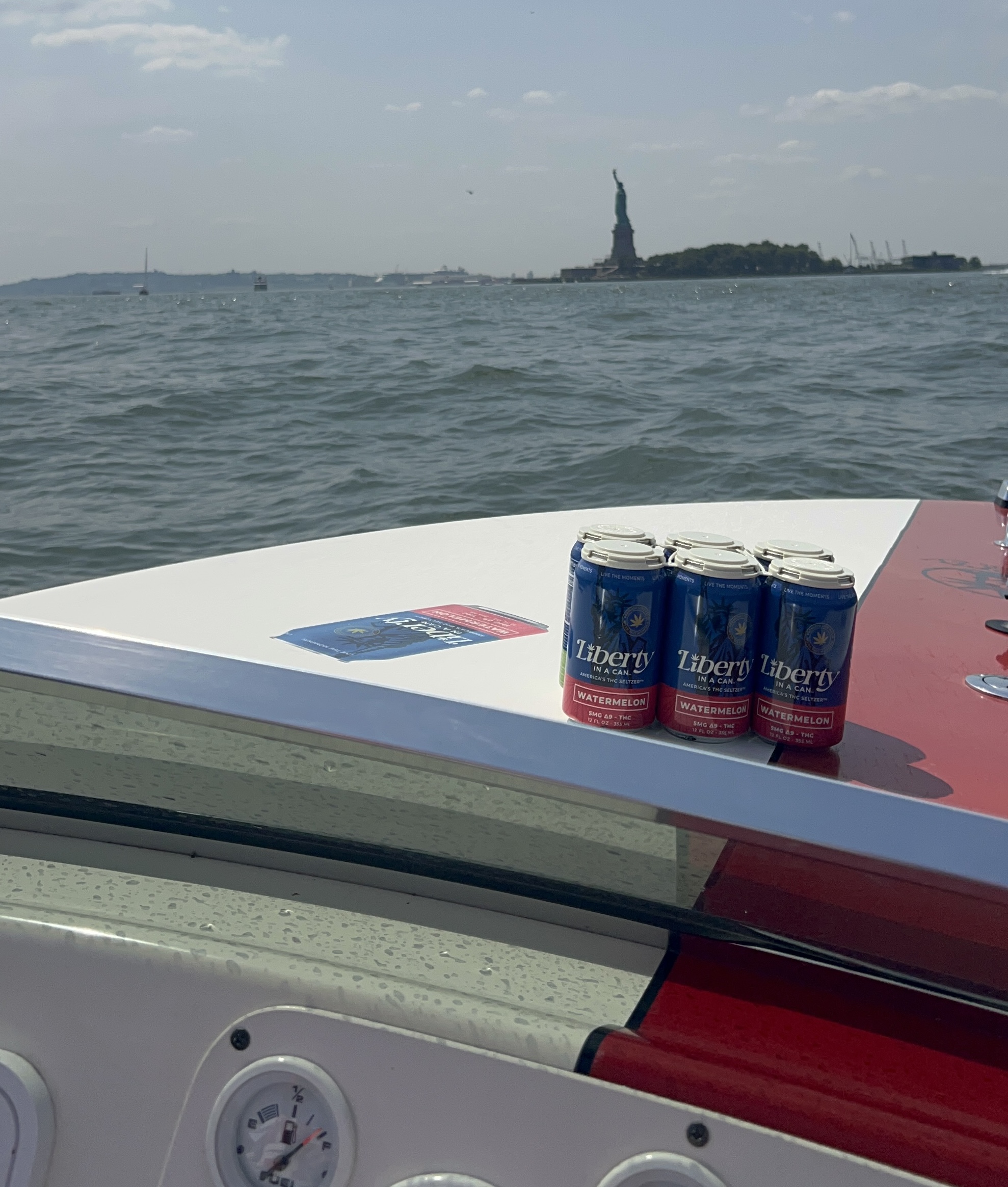 The entrepreneurs stop to refuel and take a product shot near the Statue of Liberty.